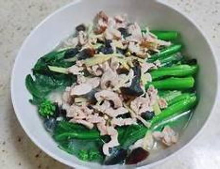 Choy sum served on a bed of tasty broth